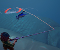 Player reeling in a Long Nosed Unicorn Fish