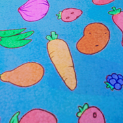Close-up of carrot on table cloth.