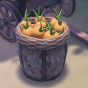 Basket of carrots next to cart behind General Store.